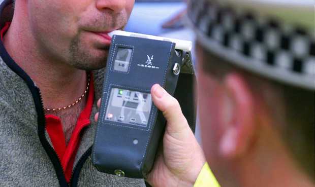 Road side breath test being performed